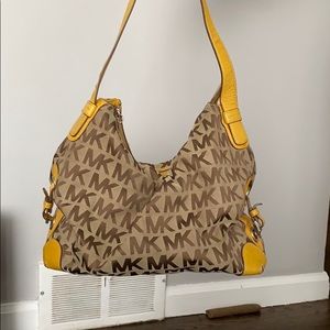Mustard colored Michael Kors purse